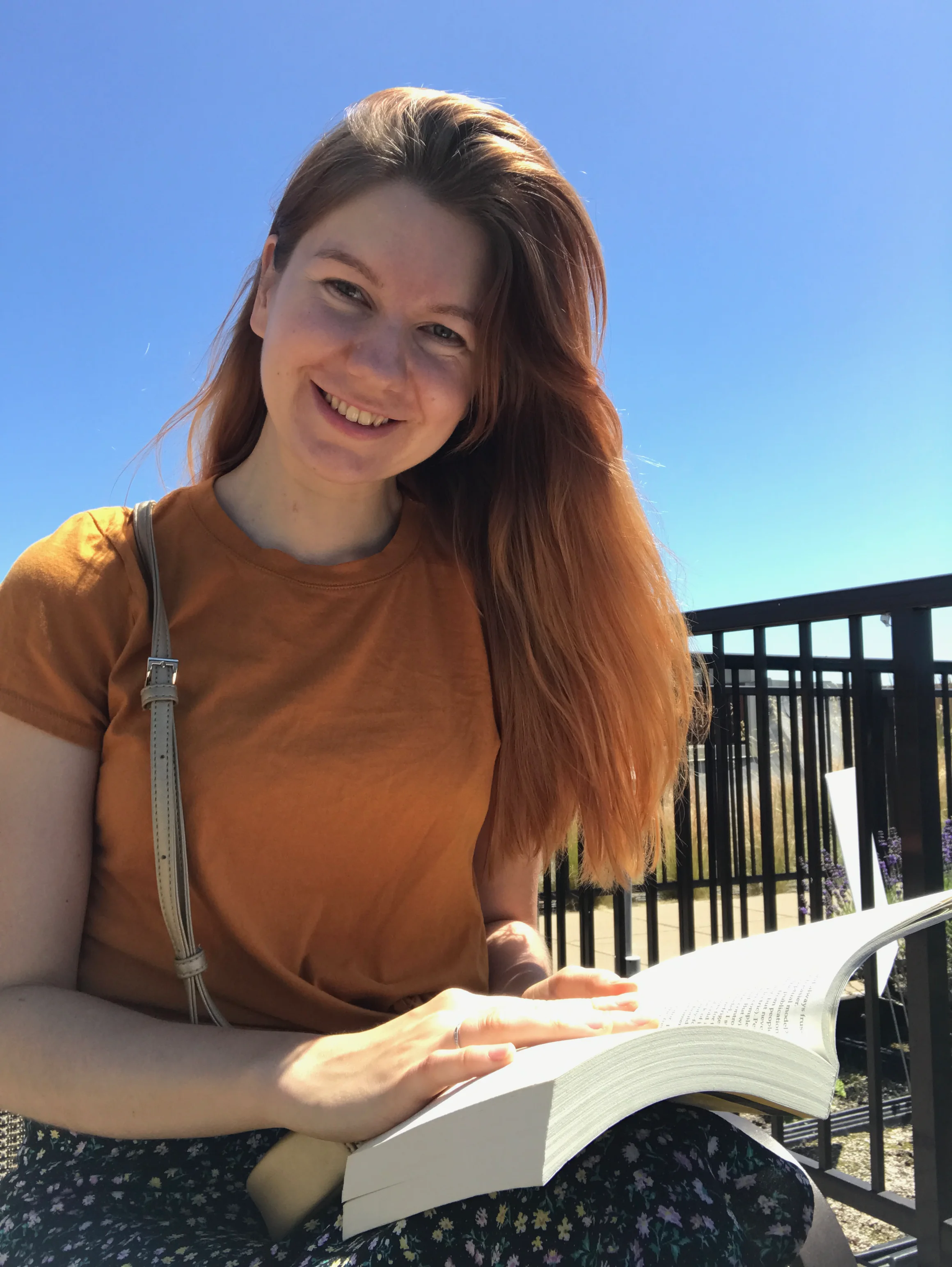 Reading a book outdoors